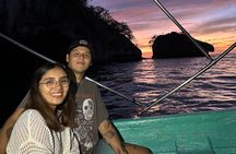 Bioluminescence & sunset boat tour to Los Arcos Sanctuary