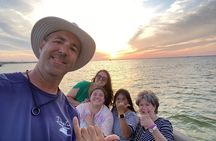 Private Guided Sunset and Dolphin Cruise up to 6 Passengers