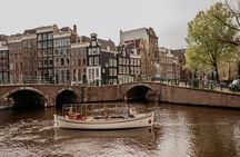Amsterdam: Private Canal Cruise with Prosecco and Dutch Snacks