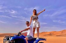 Arabian Desert Safari And BBQ Dinner Red Dunes with Camel Riding 