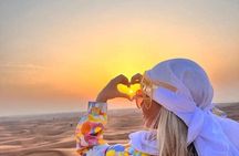 Arabian Desert Safari And BBQ Dinner Red Dunes with Camel Riding 