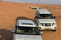 Arabian Desert Safari And BBQ Dinner Red Dunes with Camel Riding 