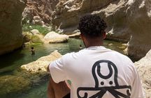 From Muscat Wadi Shab and Bimmah Sinkhole Tour