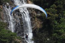 Paragliding and hammocks zipline over waterfalls private tour