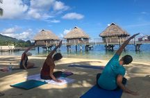Yoga on the paradise beach of Manava Moorea