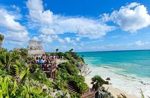Half-day Tulum ruins and cenote swim arrive before the crowds