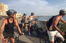 E-Bike tour in Syracuse with rich aperitif at sunset 