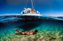 Discover Isla Mujeres: Catamaran, Snorkeling, and "Ice Bar"