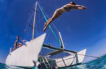 Discover Isla Mujeres: Catamaran, Snorkeling, and "Ice Bar"