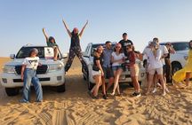 Morning Desert Safari with Camel Riding and Sand boarding 