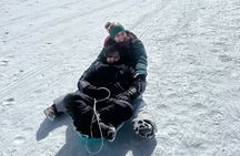 Private Winter Tour + Sledding in Rocky Mountain National Park