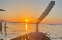 Excursion to the lagoon, sunset and boat ride.
