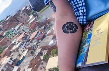 Tour of Medellin with Express Visit to Commune 13 and Artistic Book