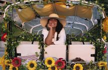 Tour of Historic and Modern Madrid with a guide in a yellow tuk tuk
