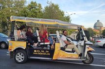 Tour of Historic and Modern Madrid with a guide in a yellow tuk tuk