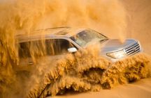 Dubai Red Dune Safari with Camel Ride, Sandboarding & BBQ Dinner