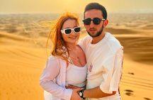 Dubai Dune Bashing Tour with Quad Bike, Sandboarding, Camel Ride