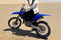 Motocross or 700 Raptor in the Sand Dunes and Beach in Agadir