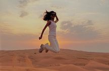 Dubai Sunrise Desert Safari, Sandboarding & Camel Ride
