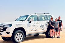Dubai Sunset Red Dune Desert Safari, Sandboarding and Camel Ride