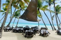 Saona Island Full Day Tour with Buffet Lunch, Paella, & Open Bar