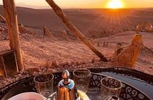 Sunset views with dinner show and came ride tour 