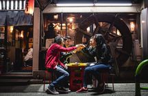 Shibuya by night in Small Groups: Neon Lights and Local Flavors