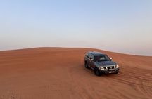 Evening Desert Safari, Camel Ride, Sand Boarding & BBQ Dinner 