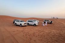 Evening Desert Safari, Camel Ride, Sand Boarding & BBQ Dinner 