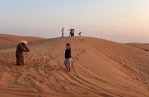 Evening Desert Safari, Camel Ride, Sand Boarding & BBQ Dinner 