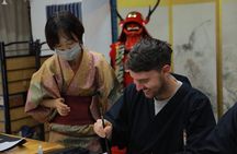 Learning Zen of Japanese Calligraphy in kimono near Osaka Castle