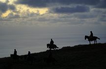 Ride to the highest point on the island for sunset