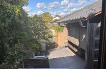Tea Ceremony in 150 Years Old Townhouse with Tables and Chairs