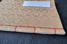Making a traditional notebook & naming on it in Hangeul in Seoul