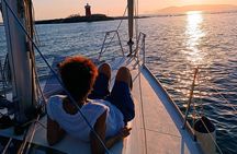 Sunset aperitif on a sailing boat in Alghero