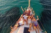 Sunset aperitif on a sailing boat in Alghero