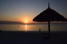 Full Day: Mnemba Island, Seafood, Natural Aquarium & Sunset Beach
