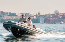 Aperitif on a boat at sunset in the Gulf of Naples