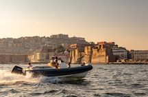 Aperitif on a boat at sunset in the Gulf of Naples