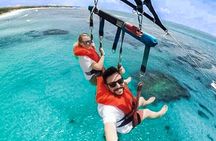 Parasailing above Turquoise Ocean Waters in Montego Bay 