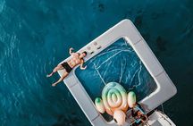 Rhapsody Phuket Coral & Racha Sunset Catamaran Cruise