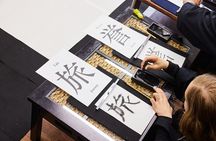 Learning Zen of Japanese Calligraphy in kimono near Osaka Castle