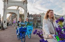 Explore Amsterdam canals on iconic Flower Bikes