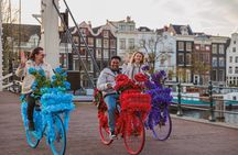 Explore Amsterdam canals on iconic Flower Bikes