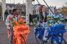 Explore Amsterdam canals on iconic Flower Bikes