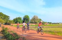 Bike the Siem Reap Countryside at Twilight with Sunset Drink