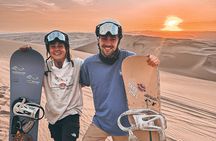 Sandboarding or Sandsky with sunset in Huacachina