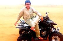 60 Min Quad Biking Tour In Dubai With Camel Ride & Sand Boarding 