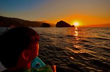 Sunset and Bioluminescence Boat Tour at Los Arcos Islands