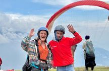 Paragliding Over Medellín + Gopro & Photos + Private transport.